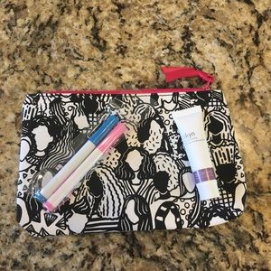 Ipsy makeup bag with markers and skin cream